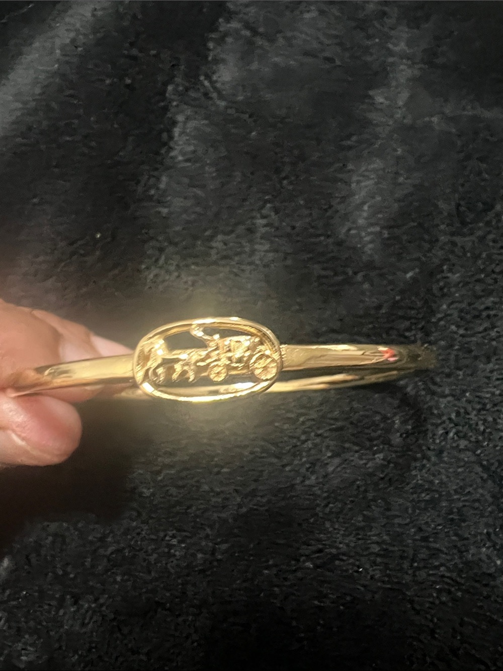 Coach Gold-Tone Floral Carriage Bangle Bracelet